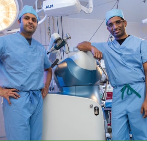 Drs Desai and Badarudeen by the Mako robotic
