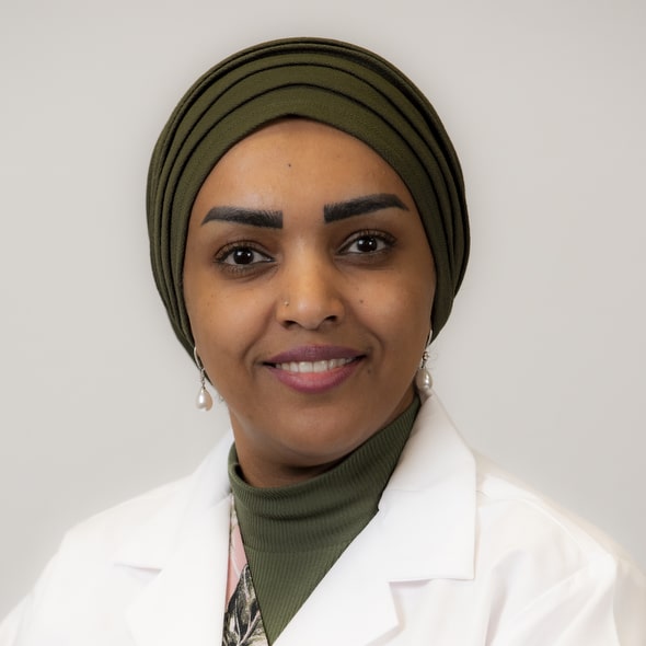 Hadia Arzoun White Coat Photo