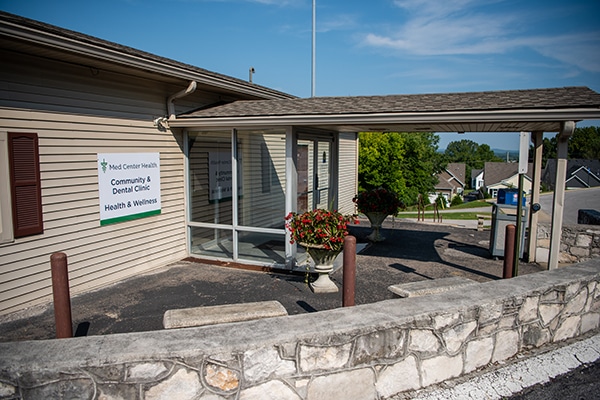Exterior view of the Community Clinic, The Dental Clinic and Health and Wellness building.