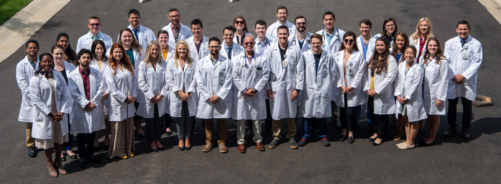 Graduate Medical Education residents and fellows pose for a group photo.